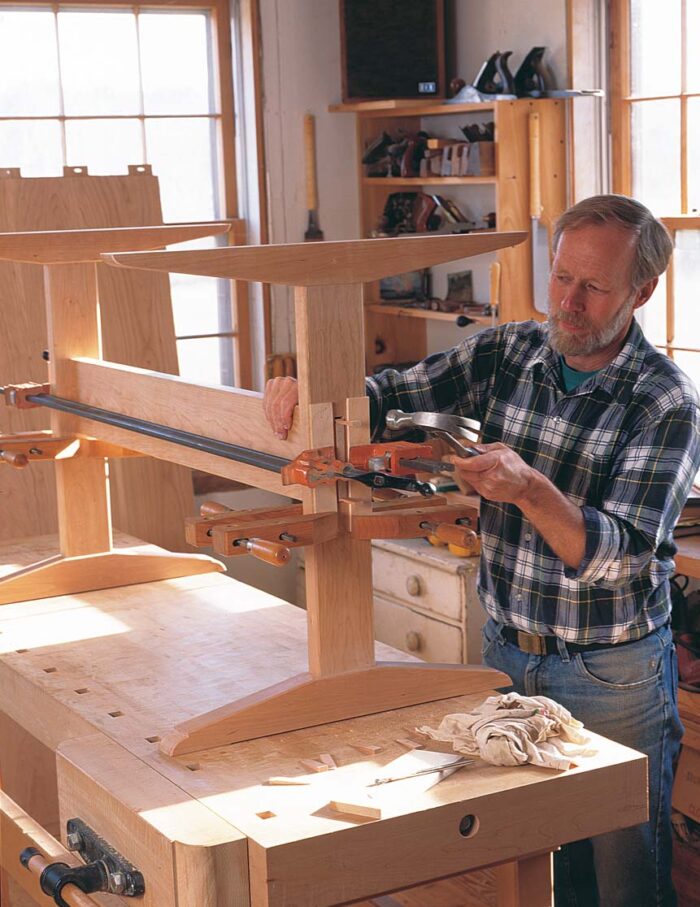 Put clamps near the through-mortises.