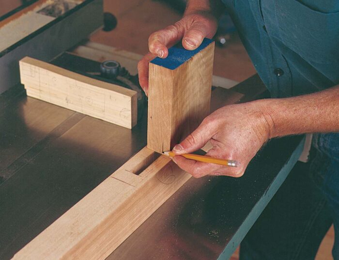 After all of the mortises have been cut, hold a scrap of stock to the mortise and mark the tenon width.