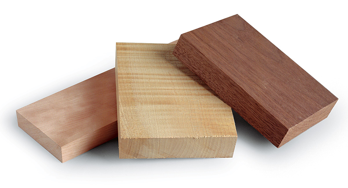pieces of cherry, curly maple, and walnut wood