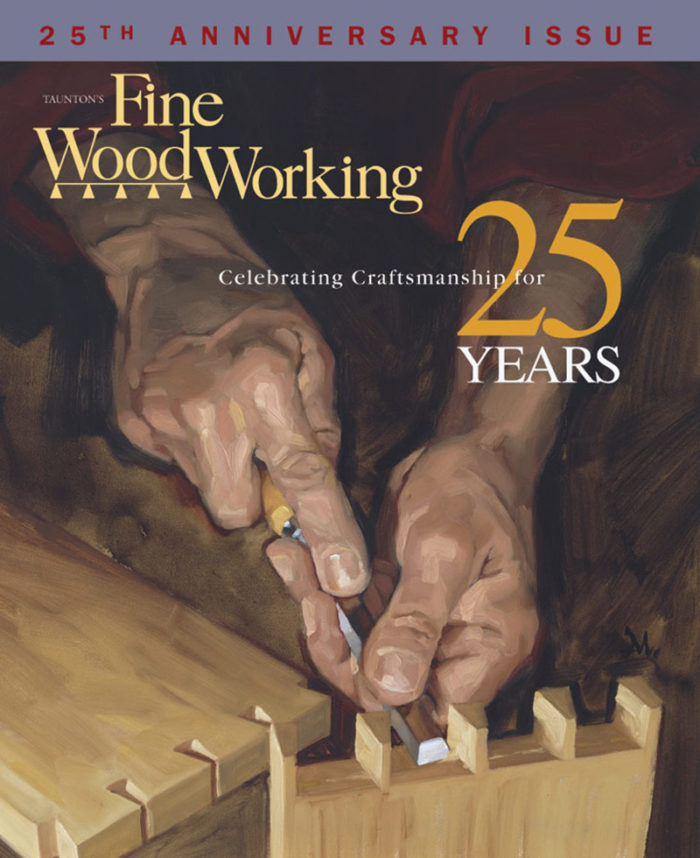 The cover of Fine Woodworking's 25th anniversary issue. The cover image is a pair of hands chiseling waste away of a pair of dovetails.
