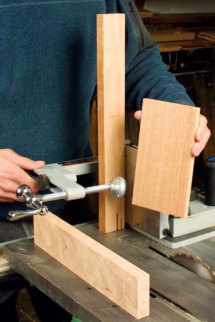 Spacer makes tenons of uniform thickness. The spacer should be a hair thinner than the width of the mortise plus the width of the sawkerf.