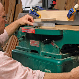 lower the infeed table of the jointer