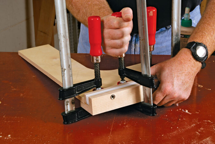 attaching the runner to base with clamps