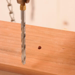 place a backer board for cleaner holes from the drill press
