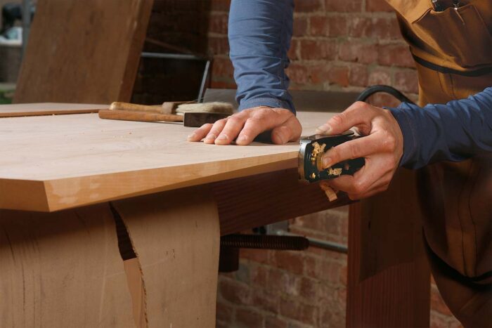 Clean up the sawn edge with a block plane