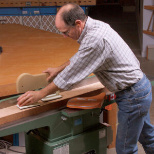 grab the push stick while moving along the jointer