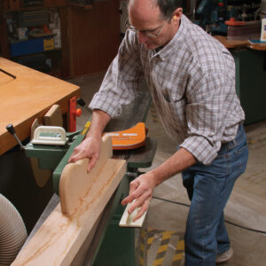 finishing push on the jointer with a push stick