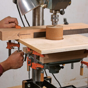 position the fence to press the piece against the drum on the bandsaw