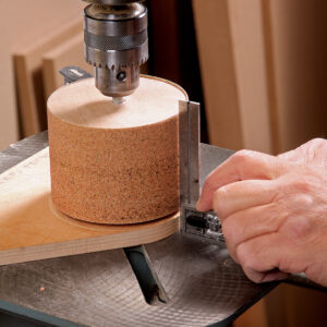 set the tip of the pattern guide flush with the drum for sanding on drill press