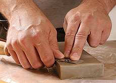 how to sharpen a chisel or plane iron freehand - flattening the back
