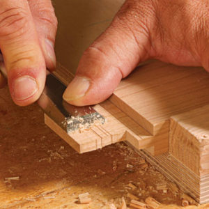 Trim to fit using a chisel or a shoulder plane.