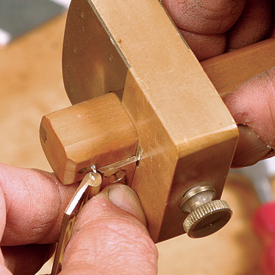 Set the first marking gauge for the width of the hinge