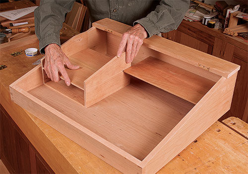 the building of the inside compartments of the desk