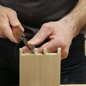 Refined. A long handle attached to the blade improves control, converting the tool into a paring chisel.