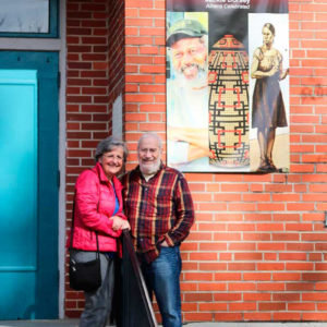 Abraham and his wife, Carmen, outside the Wood Works show.