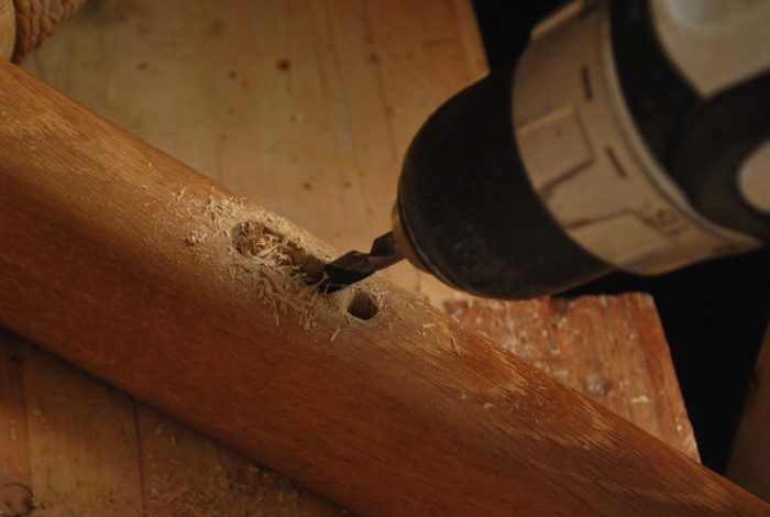 drill holes to remove tenon 
