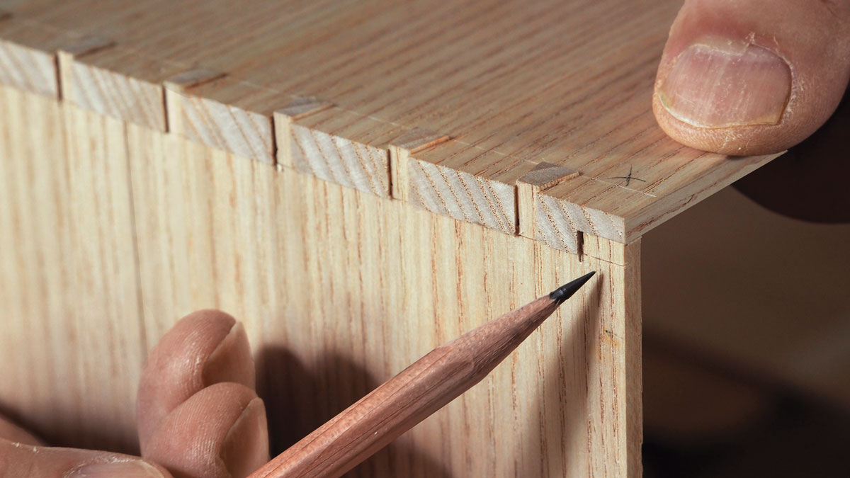 pencil pointing to dovetail
