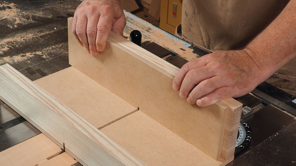 Cut a notch in the MDF using the same blade you’ll use to cut the box joints, and trim a piece of stock to fit the notch