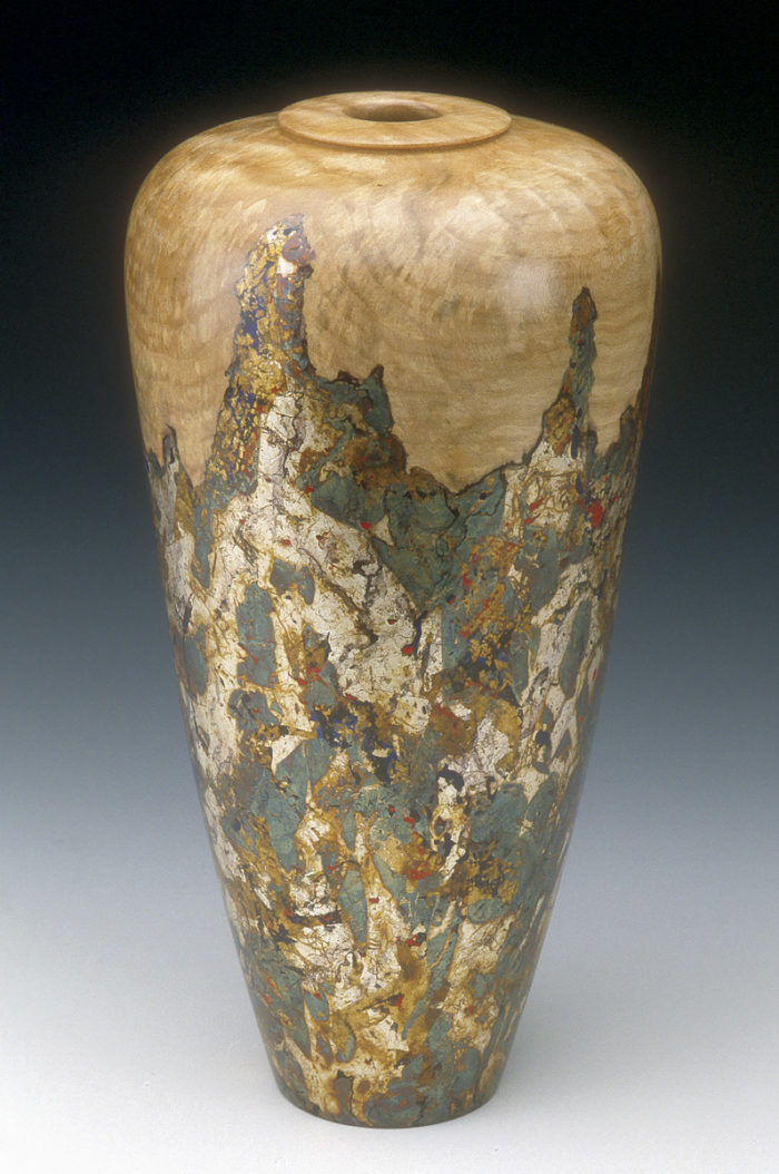 Maple vase with a metal patina finish.
