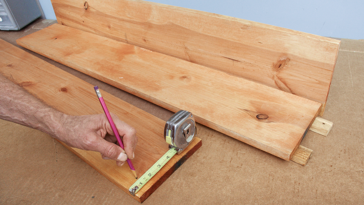 Use a power miter saw or a hand miter saw to cut three 1x8s to the width of the planter minus 1-1/2 in.