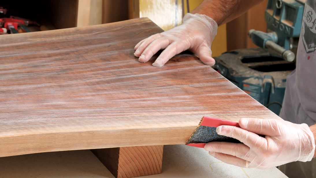 Apply three or four coats of oil-based polyurethane, sanding with 220-grit paper between coats.
