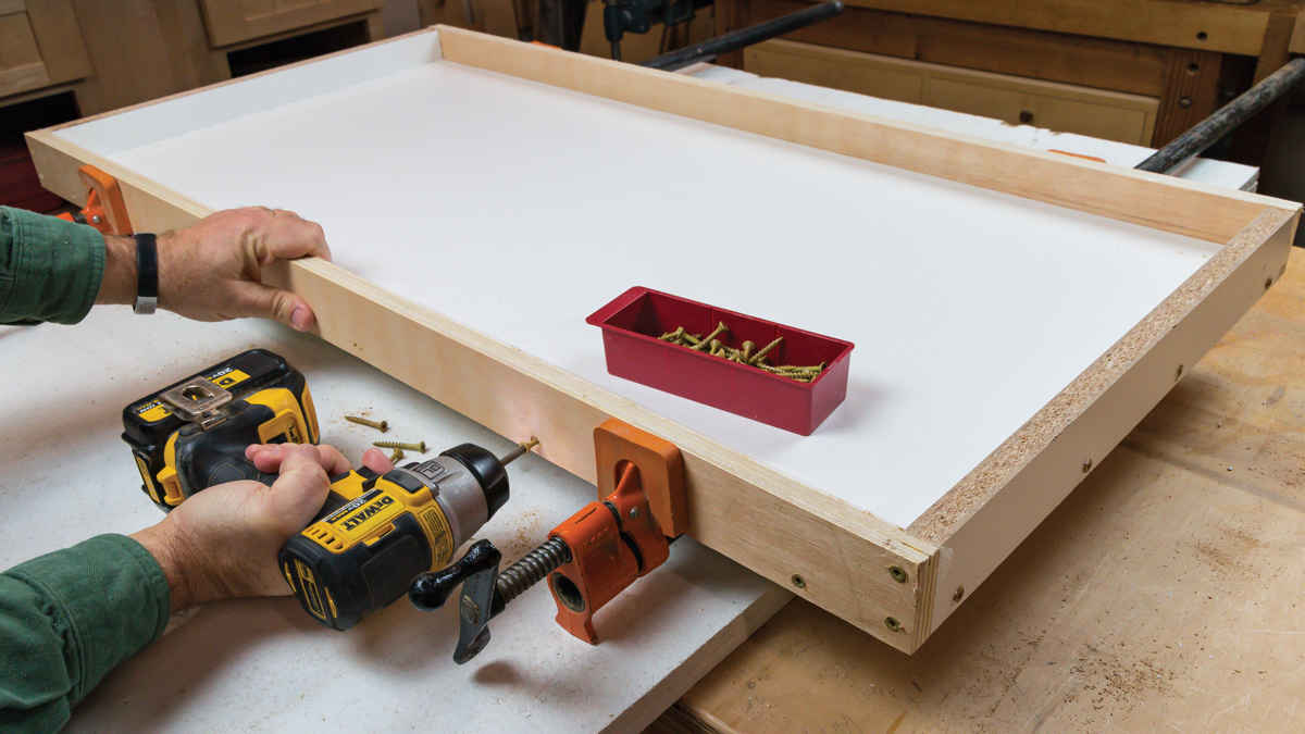 If you have long clamps, it helps a lot to clamp the parts in place before driving the screws.