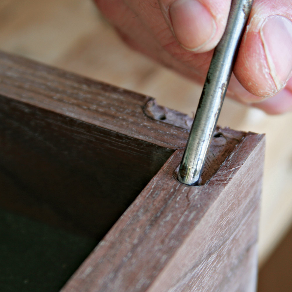 Use a small gouge to cut the curved portions