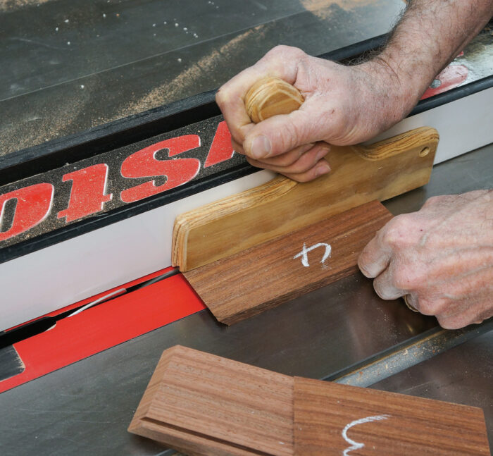 Using a tablesaw to cut grooves in the sides of a board