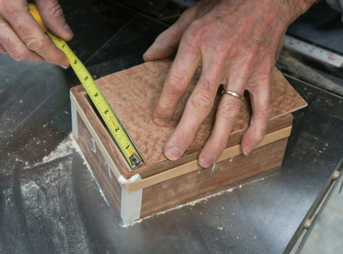 Measuring for size of veneered panel