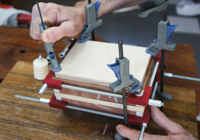 Using a block of wood to distribute clamping pressure