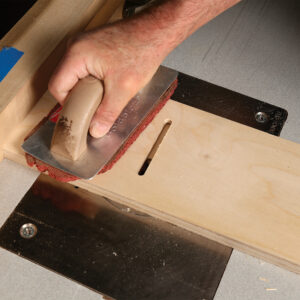 cut a groove that will hold the tablesaw l-fence