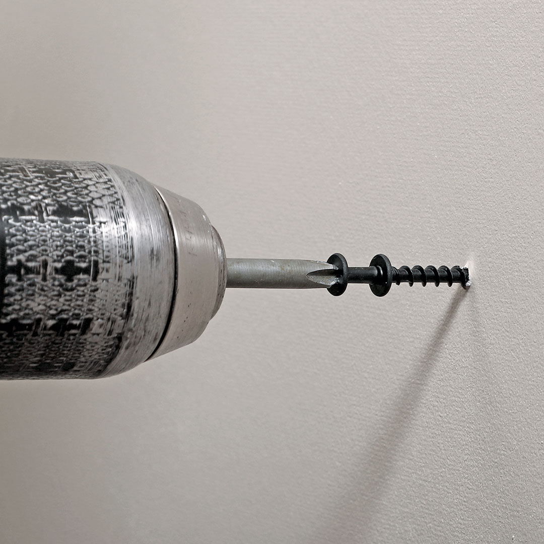 Bear Claw Screws drilled in wall