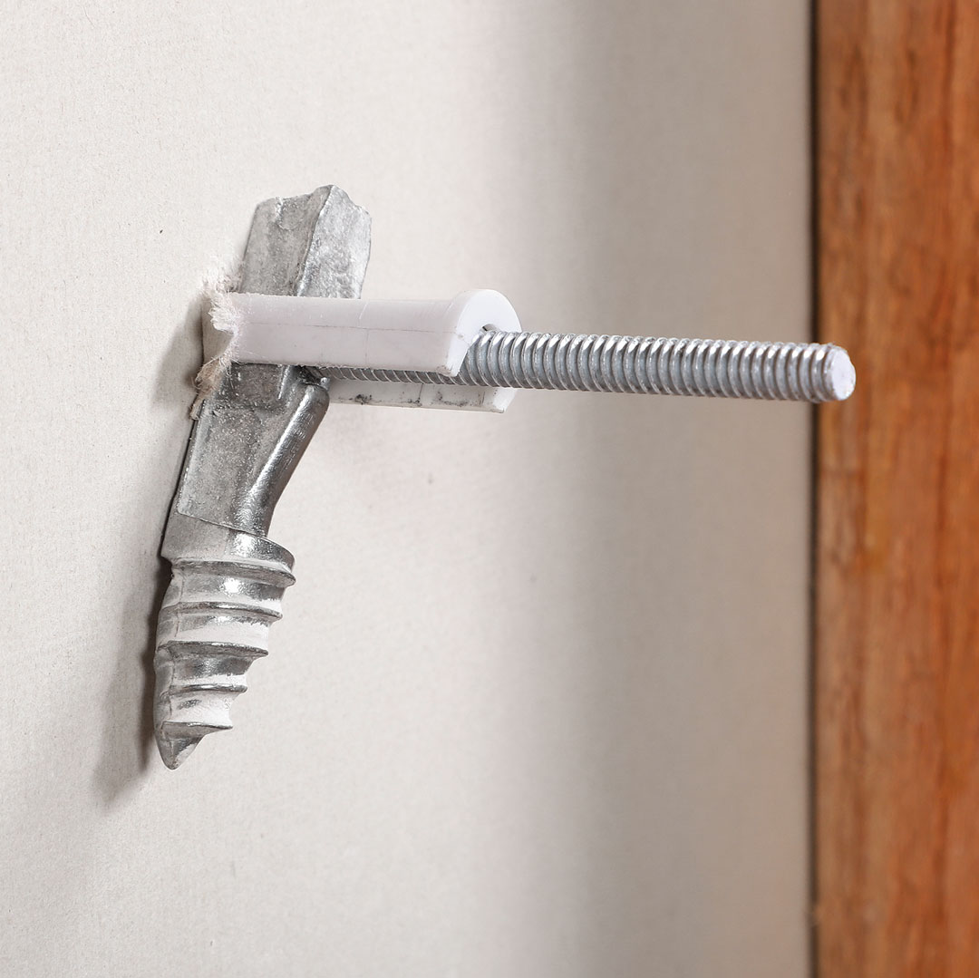 Then you tighten the screw until the toggle is firmly drawn to the back of the drywall.