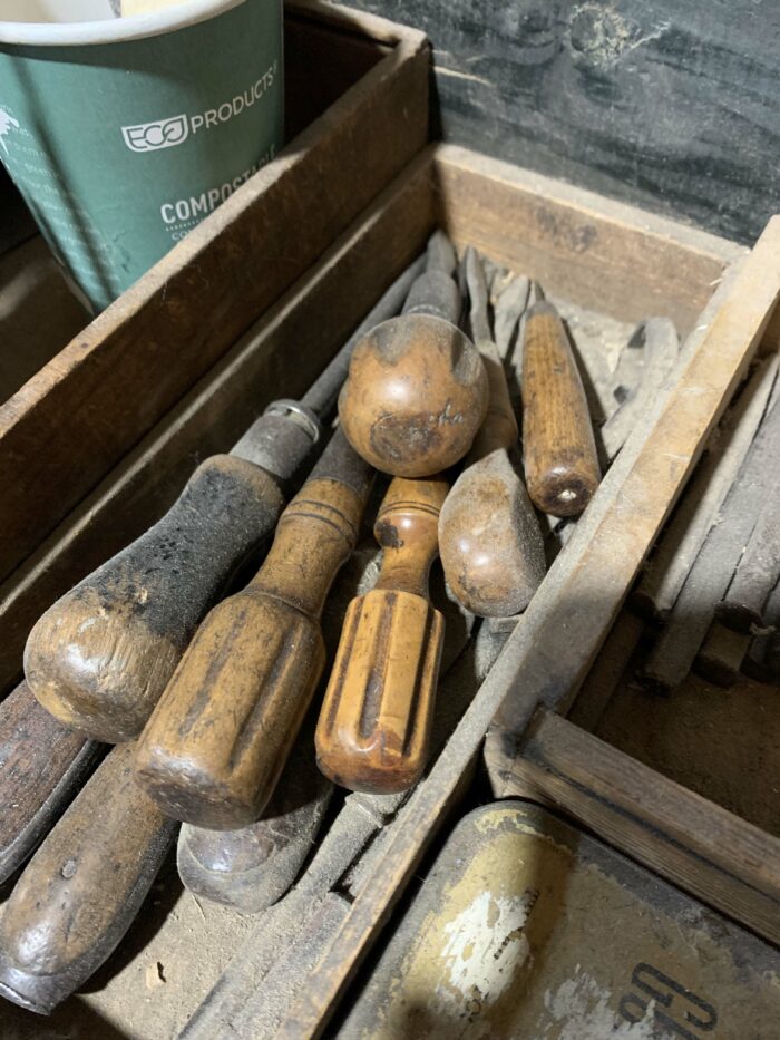 box of wooden handled screwdrivers