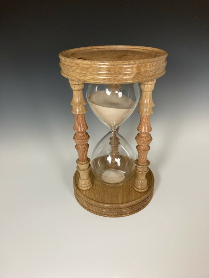 An hourglass carved from wood of the Willow Oak.