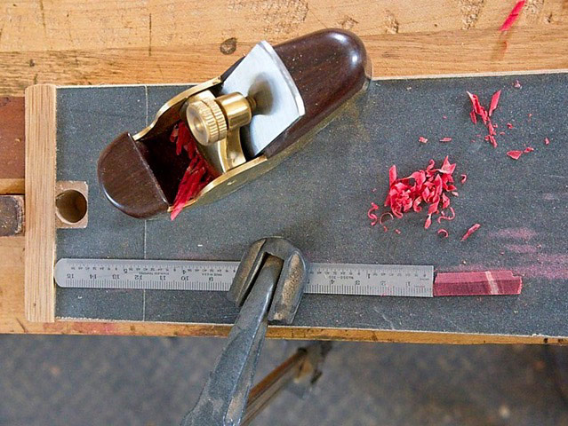 Preparing the inlay blank with red contrasting wood.