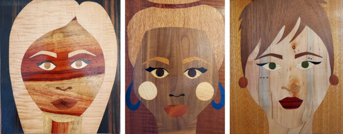 Chelsea Van Vorhis' piece, "WE ARE THE SILENT SURVIVORS ROOM SCREEN", a room divider decorated with works of art crafted from various wood veneers to make up many women's faces.