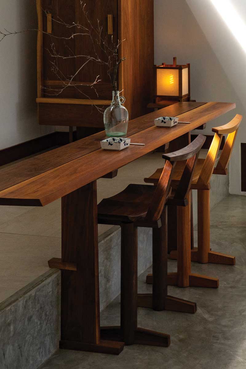 wooden hightop bar and stools