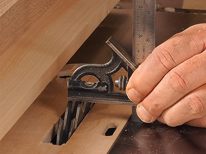 Use a combination square to set the blade height