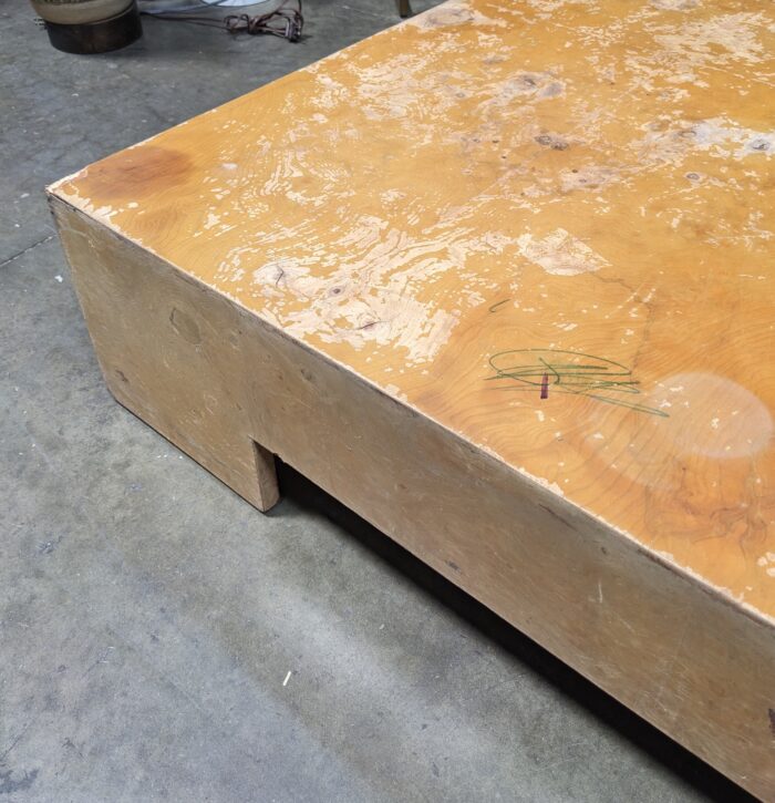 A coffee table with a ruined finish