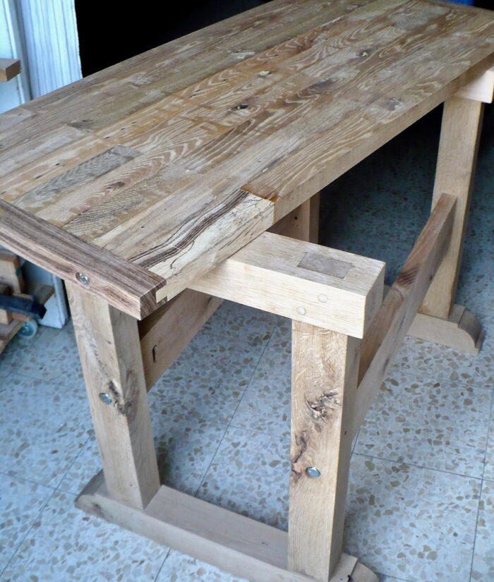A workbench made from a shipping pallet.