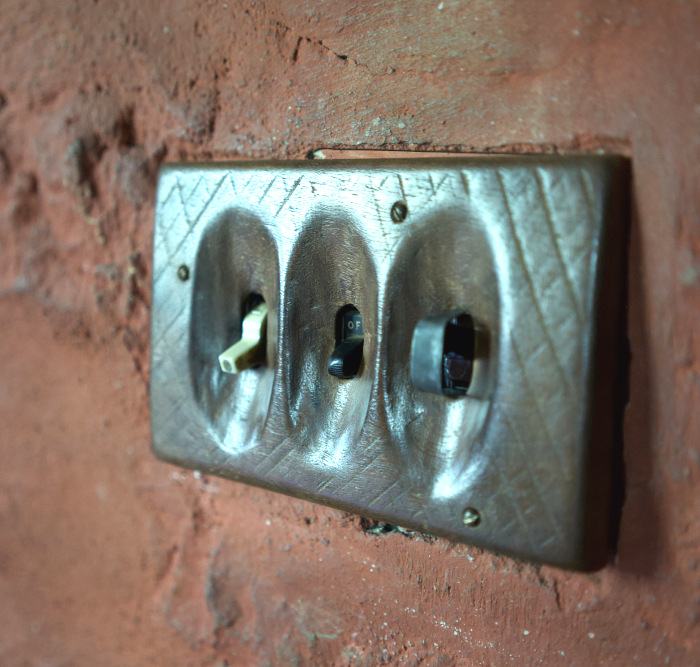 A carved light switchplate in Wharton Esherick's studio.