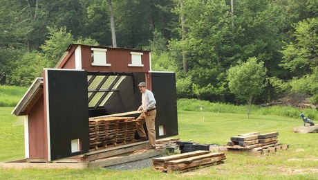 Drying wood in a solar kiln