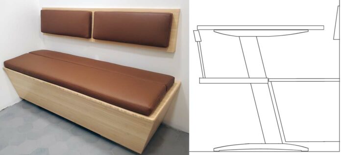 A padded bamboo bench and a drawing 