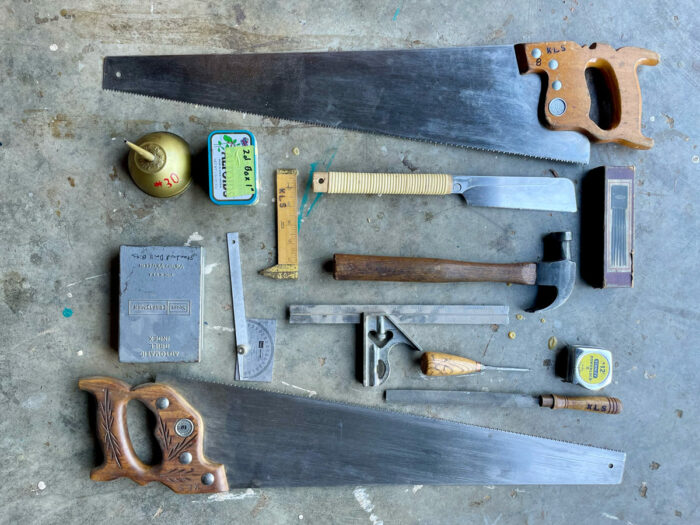 A flat lay of various hand tools.